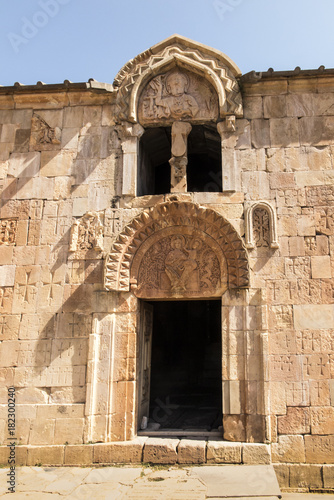 Wallpaper Mural Armenia, the monastery of Noravank. The central entrance to the church of John the Baptist with a unique bas-relief depicting God the Father. Torontodigital.ca