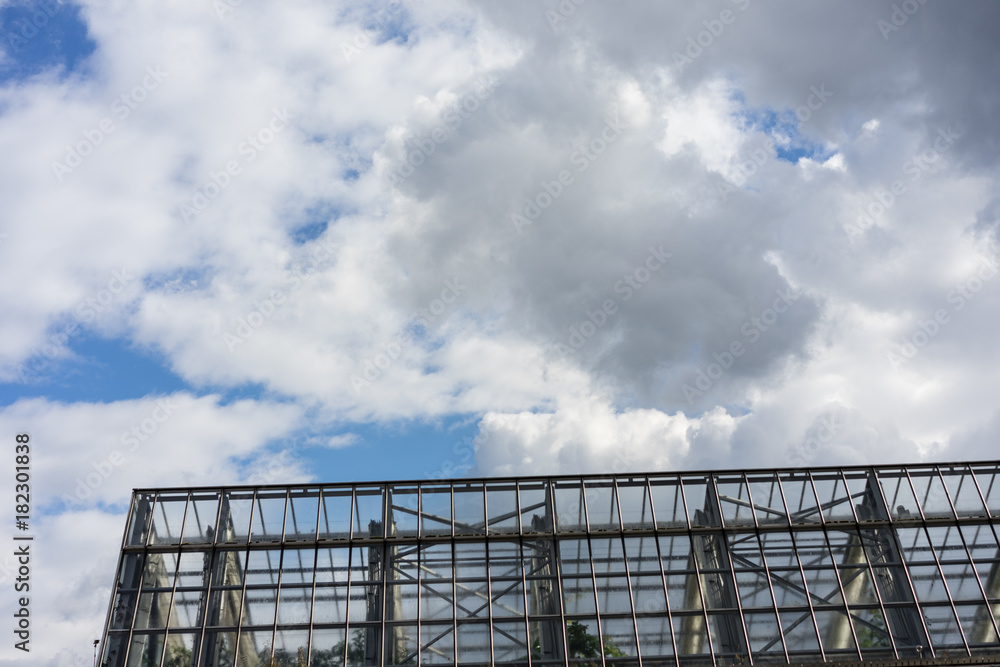 metal fence gate structure with cloudy sky metal fence gate structure with cloudy sky