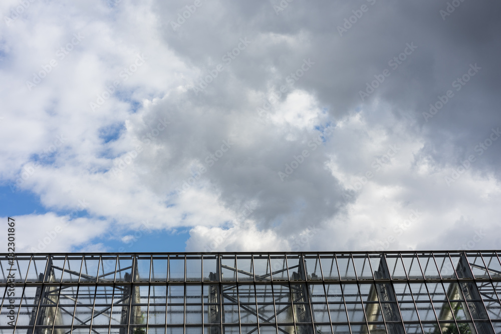 metal fence gate structure with cloudy sky metal fence gate structure with cloudy sky