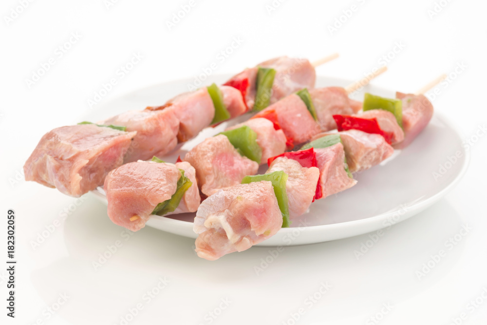 skewers of raw meat and vegetables skewers of raw meat and vegetables