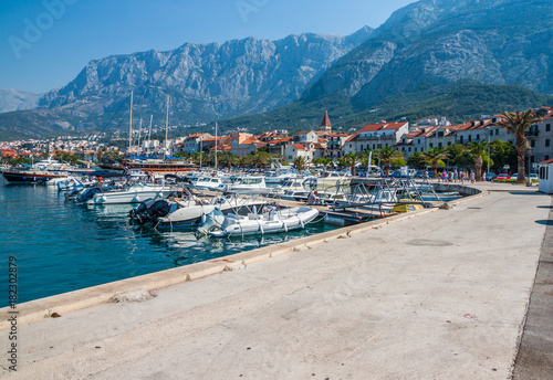 Motor boats parked at pier in Makarska city. Popular tourist destination. Croatia © cone88