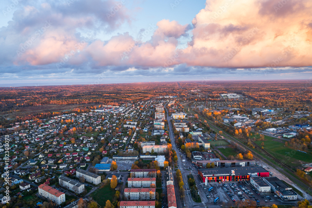 Aerial view of the city at sunset. Beautiful autumn city landscape. Aerial view of the city at sunset. Beautiful autumn city landscape.