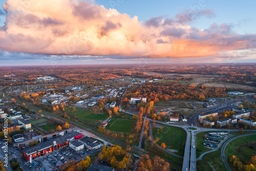 Aerial view of the city at sunset. Beautiful autumn city landscape. © nikwaller