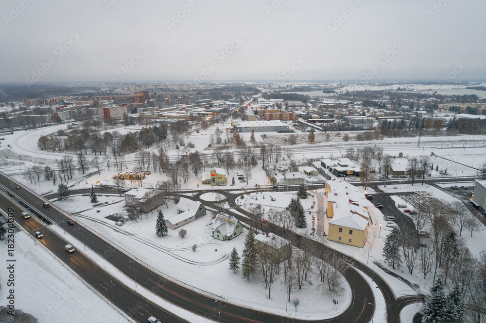 Aerial view of the city covered with snow.