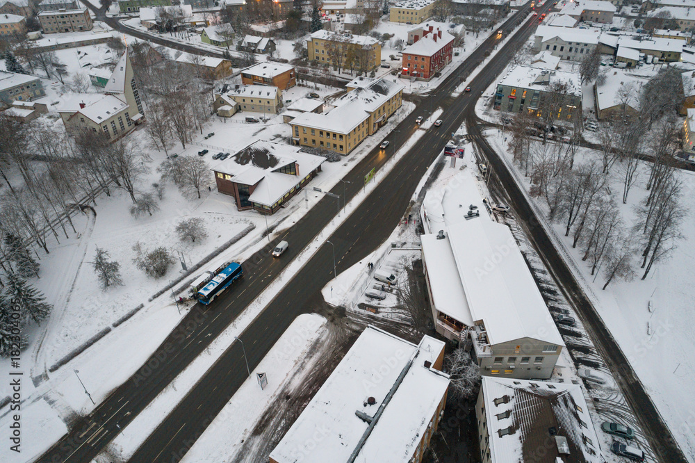 Aerial view of the city covered with snow.