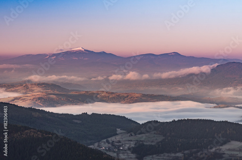 Misty mountain landscape in the morning with Babia Gora mountain  Poland