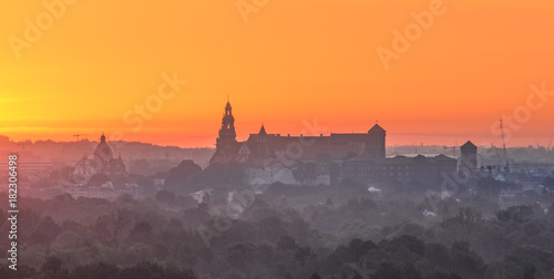 Krakow, Poland, Wawel castle silhouette at sunrise © tomeyk