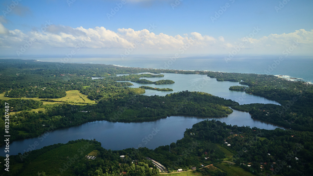 beautiful tropical lake in jungle aerial shot