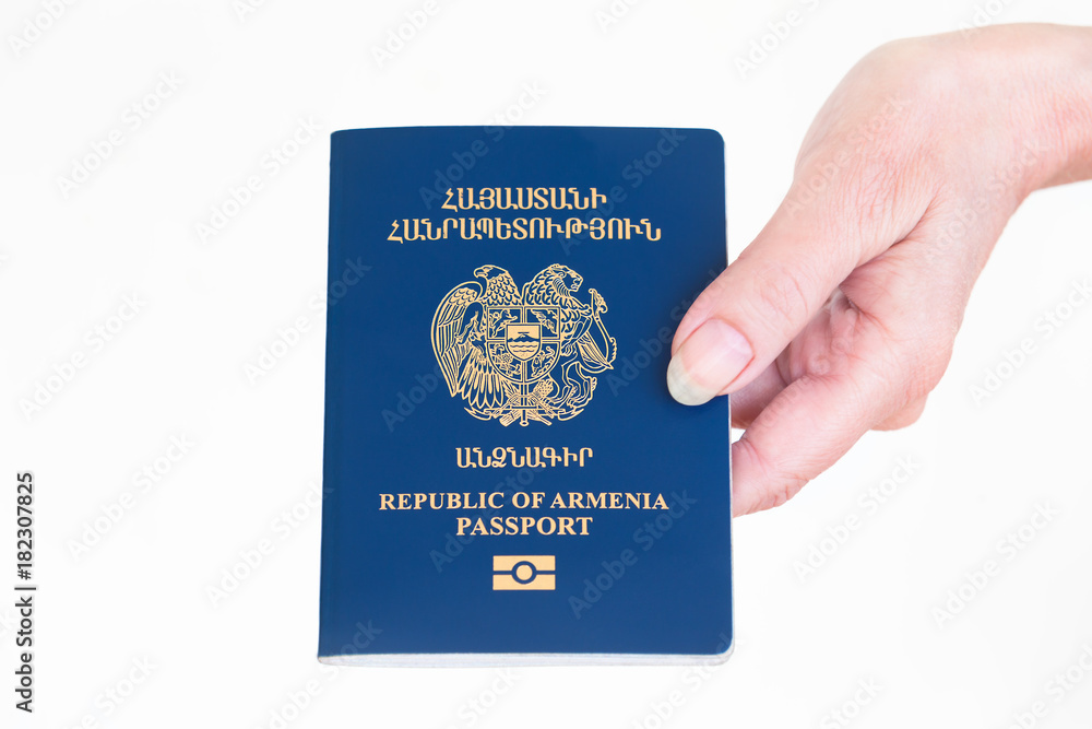 Hand holding Republic of Armenia Passport, Vacation Concept, Armenian