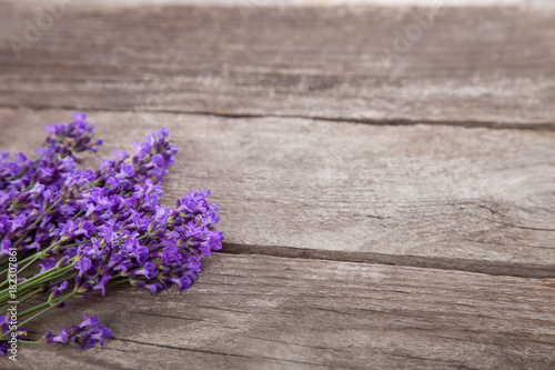 Bouquet of summer lavender on an old wooden background  top view 