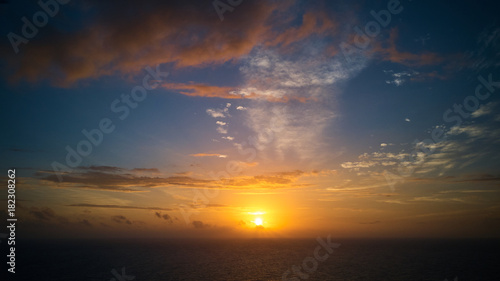 Beautiful sunset over ocean aerial shot