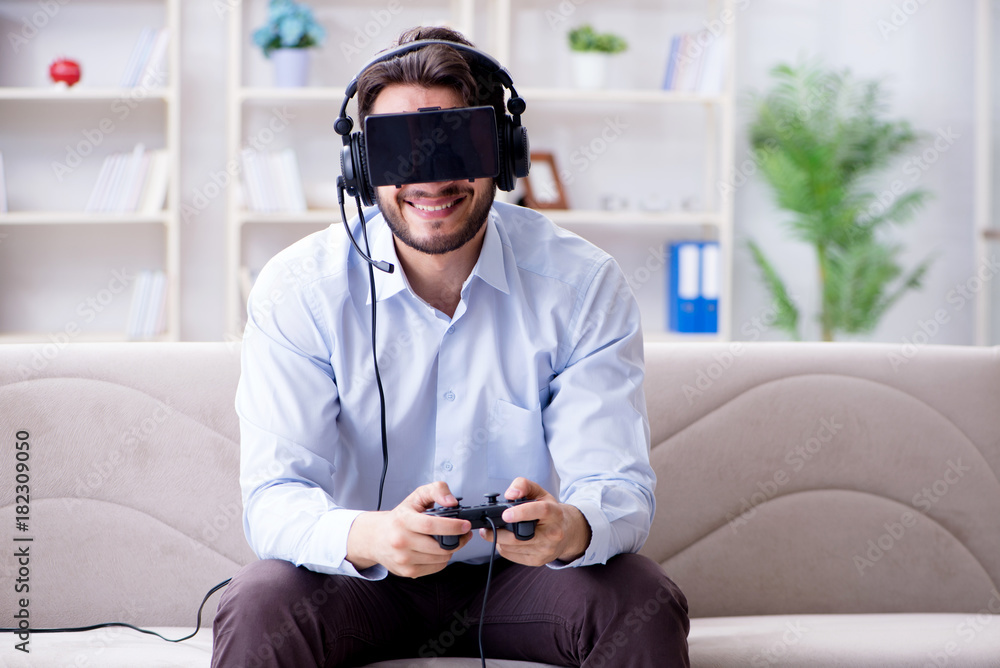 Student gamer playing games at home Student gamer playing games at home