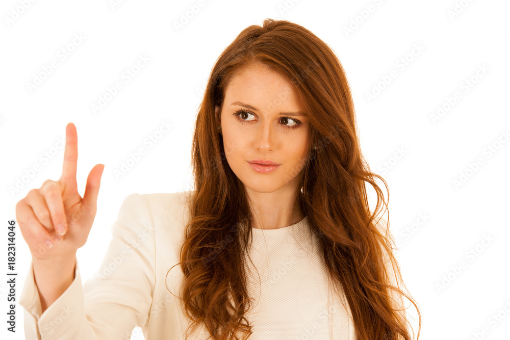 Attractive business woman pressing a virtual button Attractive business woman pressing a virtual button