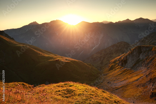 golden sunrise in mountains
