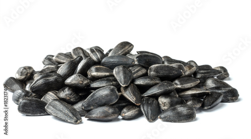 Heap of sunflower seeds isolated on the white background.