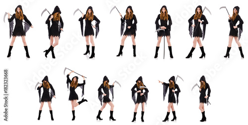 Young witch with scythe isolated on white