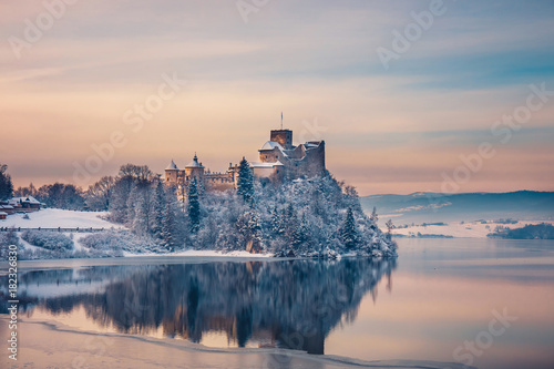 Beautiful view of Niedzica Castle during a frosty evening, Poland