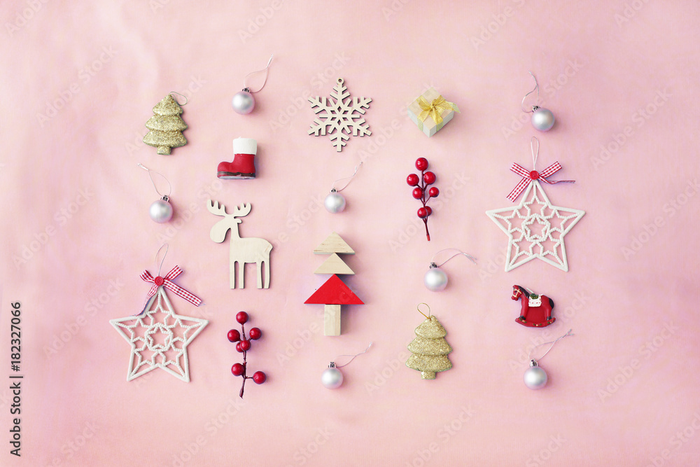 Christmas decorative ornaments and gifts on pastel background in vintage color
