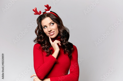 funny young woman in Christmas headband