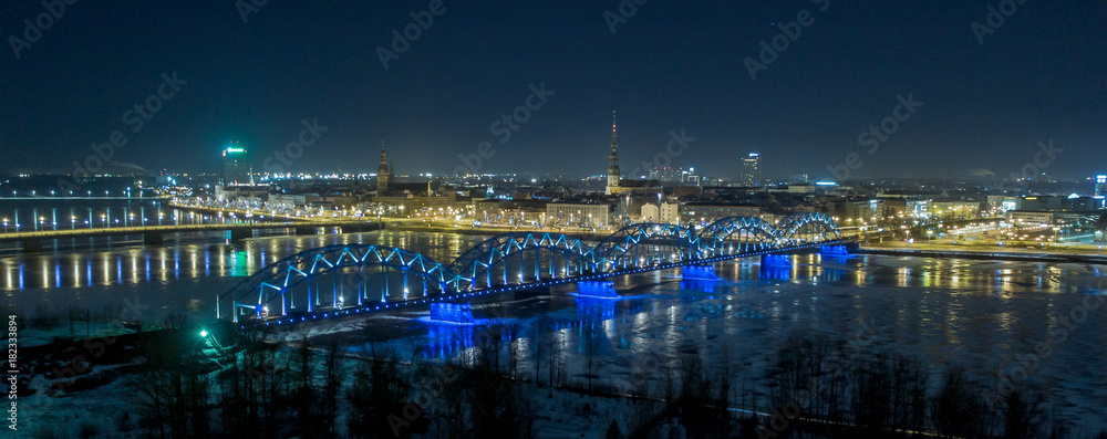 Riga city bridge And Old Town Autumn Drone flight trafics and cars above night