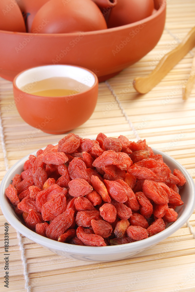 Red dry goji berries in a bowl Red dry goji berries in a bowl
