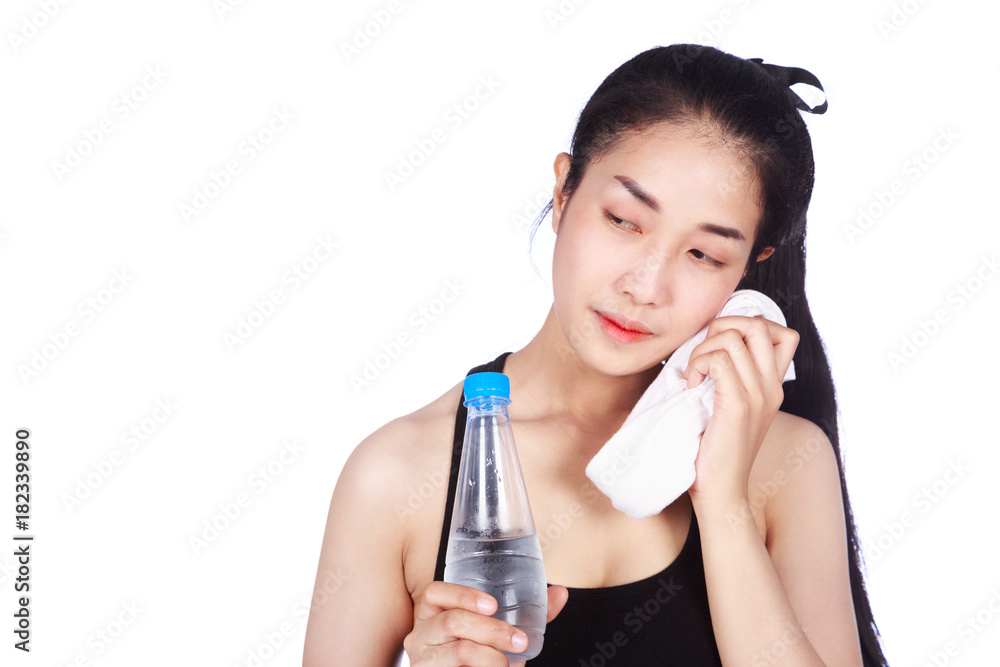 sporty woman with towel and water bottle isolated on white background sporty woman with towel and water bottle isolated on white background