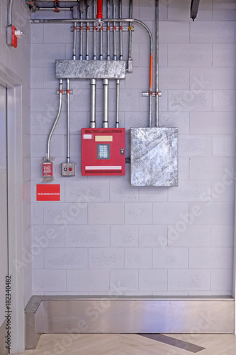 fire alarm switch on wall. Electrical Conduit & PVC Conduit
