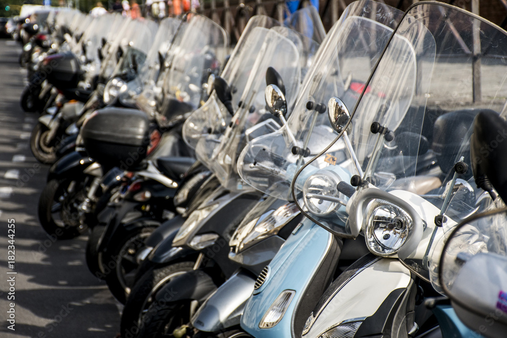 Scooter motorcycle parking in Florence Italy