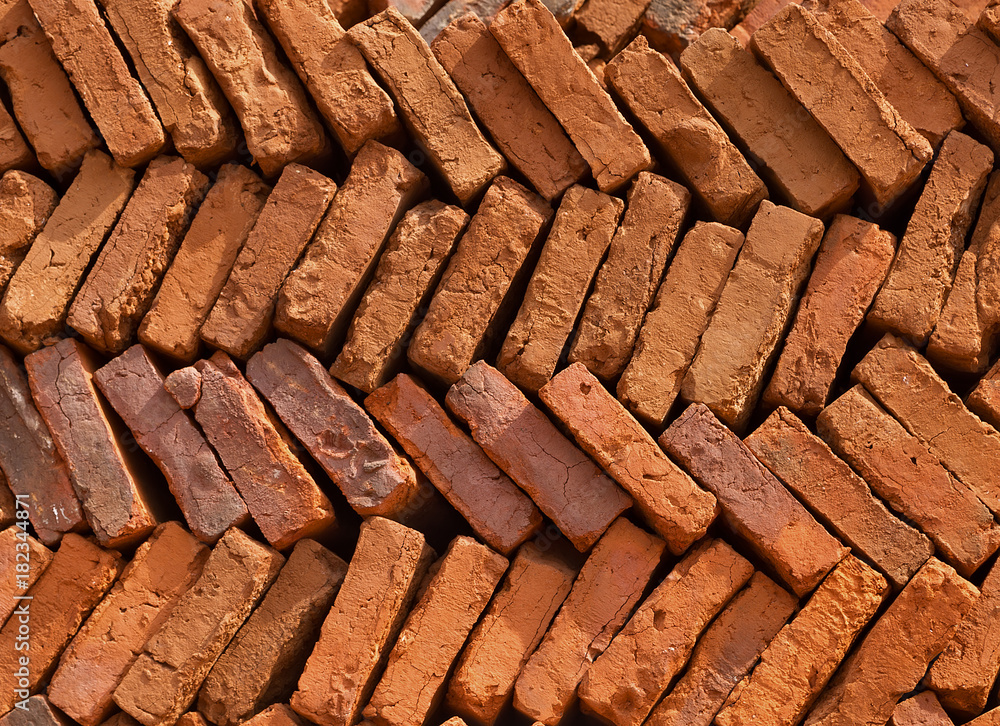 a pile of bricks background building materials a pile of bricks background building materials