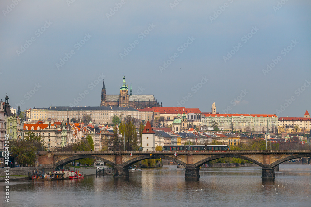 View of Charles bridge and the Castle over Vltava river in Prague, Czech Republic
