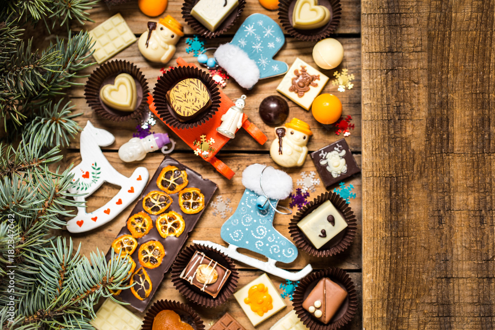 chocolate sweets, chocolates with Christmas symbols, toys, tree