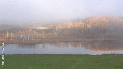 Cloud october morning on the Gorodishchenskoye lake. Izborsk, Pskov region photo