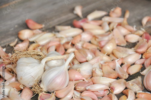 Garlic Cloves and Garlic Bulb on wooden background, Garlic, healthiest vegetables in house