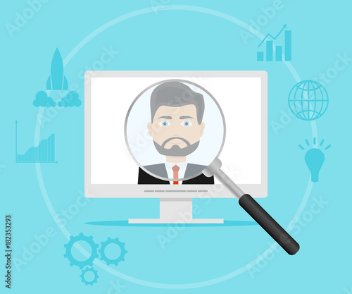 A magnifying glass looks at the person in the computer.