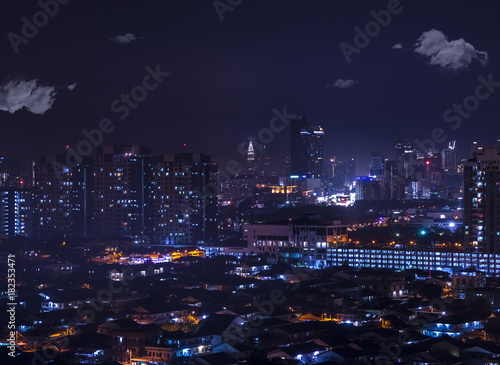 Fotografija A sea of lights in the city: aerial night view of Petaling Jaya leading to Kuala