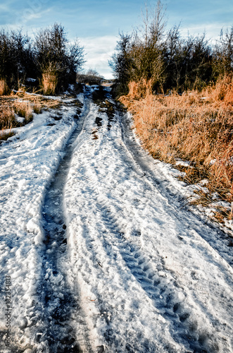 Icy winter country road