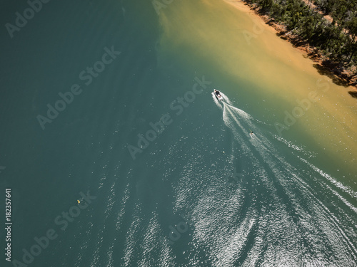 Aerial photograph: A ski boat tows a waterskiier at Waroona Dam, south of Perth, Western Australia. photo