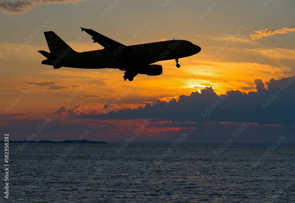 Contour of Passenger plane over night sea Contour of Passenger plane over night sea