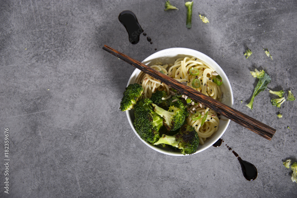 Delicious oriental food spaghetti with roasted broccoli. Healthcare concept. Delicious oriental food spaghetti with roasted broccoli. Healthcare concept.
