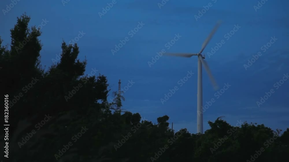 Working wind engine. Dusk at Windmill viewpoint. Phuket island, Thailand. Working wind engine. Dusk at Windmill viewpoint. Phuket island, Thailand.