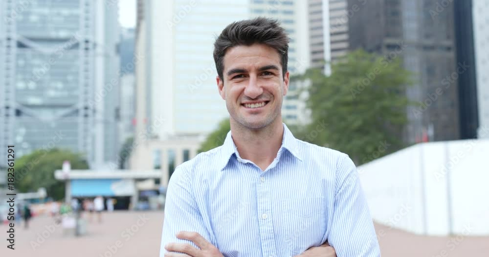 Hispanic businessman smile to camera Hispanic businessman smile to camera