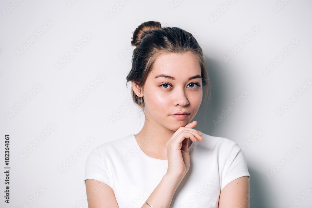 Portrait of beautiful blue-eyed girl on a white background Portrait of beautiful blue-eyed girl on a white background