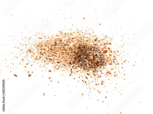 Milled nutmeg, powder isolated on white background, top view