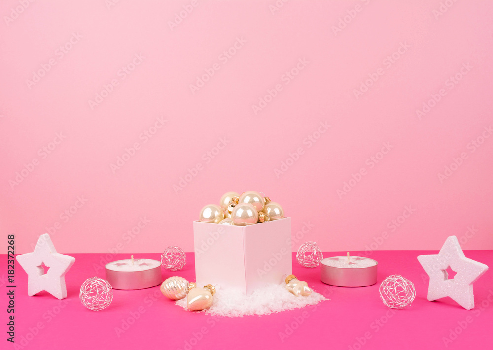Christmas tree balls on a pink background