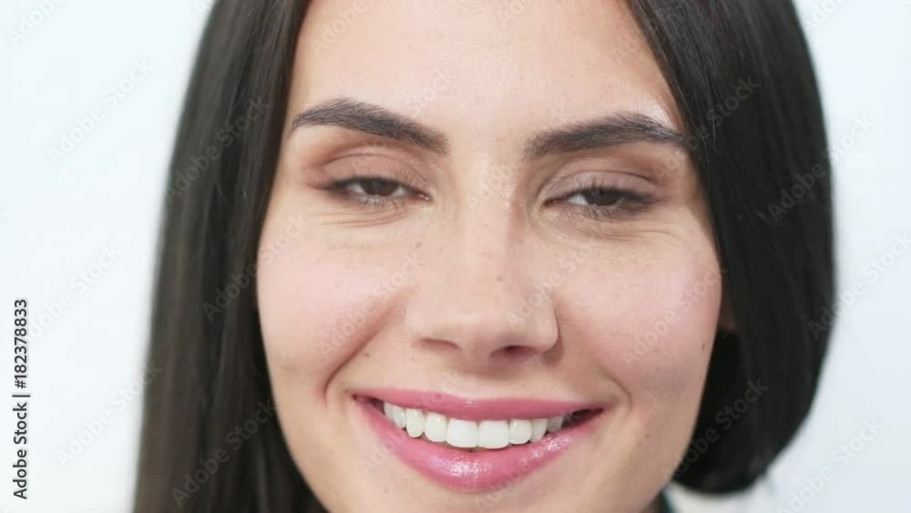 Range of emotions. Close up of a positive young beautiful woman smiling while expressing joy Range of emotions. Close up of a positive young beautiful woman smiling while expressing joy