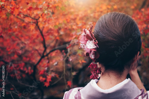 Japanese woman hair style with traditional kimono in autumn japan, Travel concept