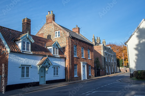 Old town houses in typical English village street. Wymondham UK. photo