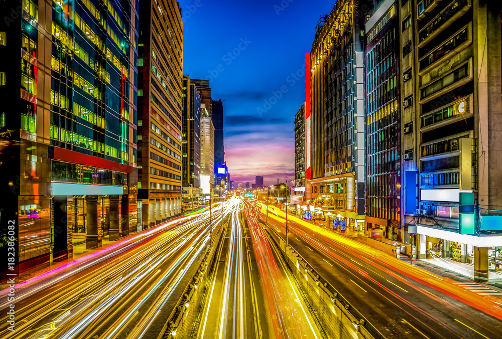 Twilight shot with light line on the road and no logos at the light box on building, Taipei, Taiwan.