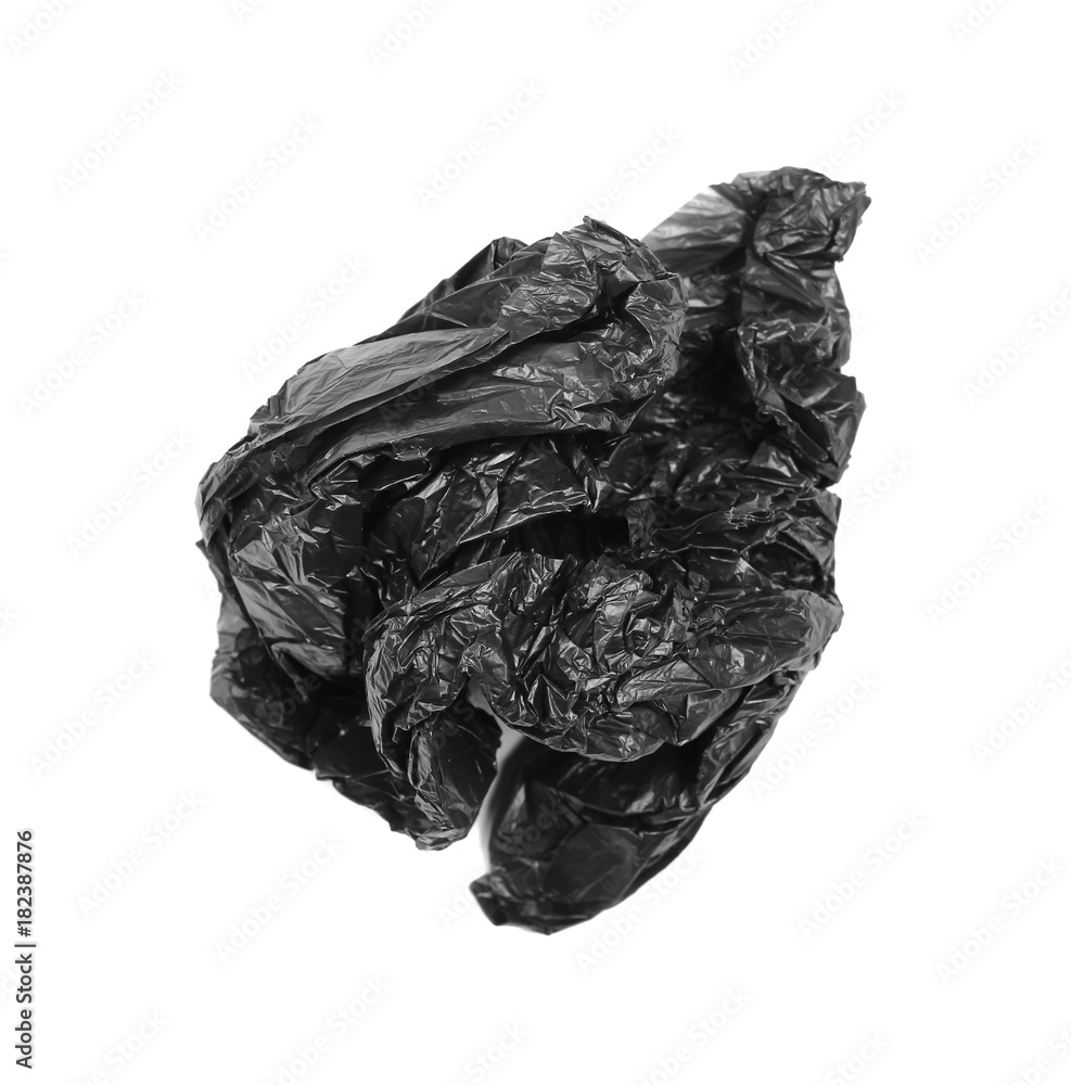 Crumpled black plastic garbage bag, isolated on white background, top view