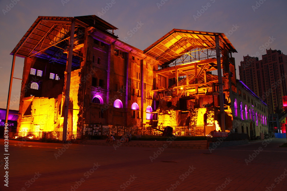 Fototapeta premium Abandoned factory buildings at night